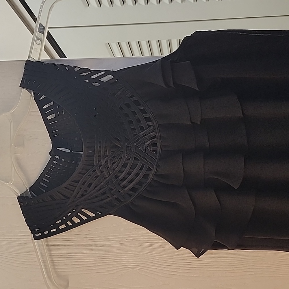 Black sleeveless top in size medium